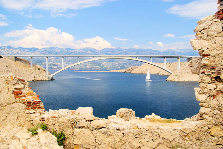 The Pag bridge crossing the sea channel on the road to Novalja